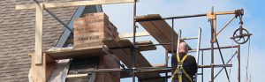 Chimney being repaired by a professional